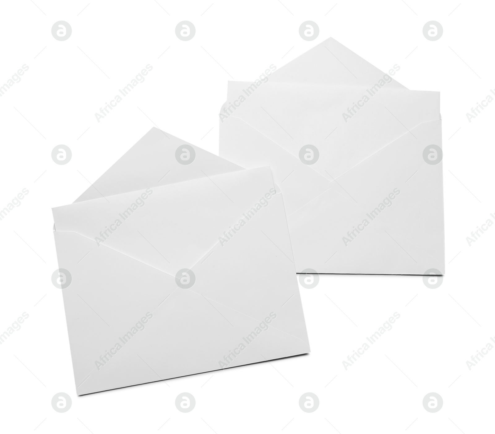 Photo of Envelopes with cards isolated on white, top view. Mockup for design