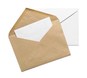 Photo of Envelopes with card isolated on white, top view. Mockup for design