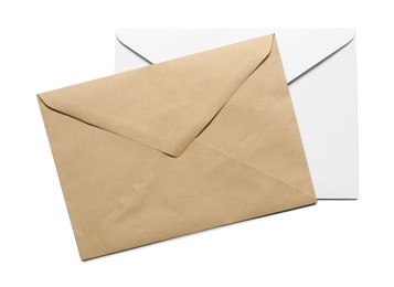 Photo of Envelopes isolated on white, top view. Mockup for design