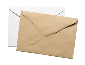 Photo of Envelopes isolated on white, top view. Mockup for design