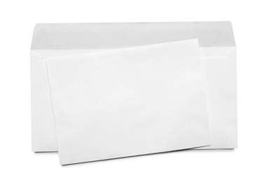 Photo of Envelopes isolated on white, top view. Mockup for design