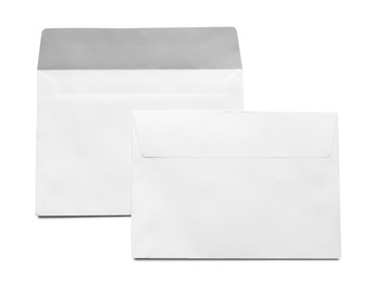 Photo of Envelopes isolated on white, top view. Mockup for design