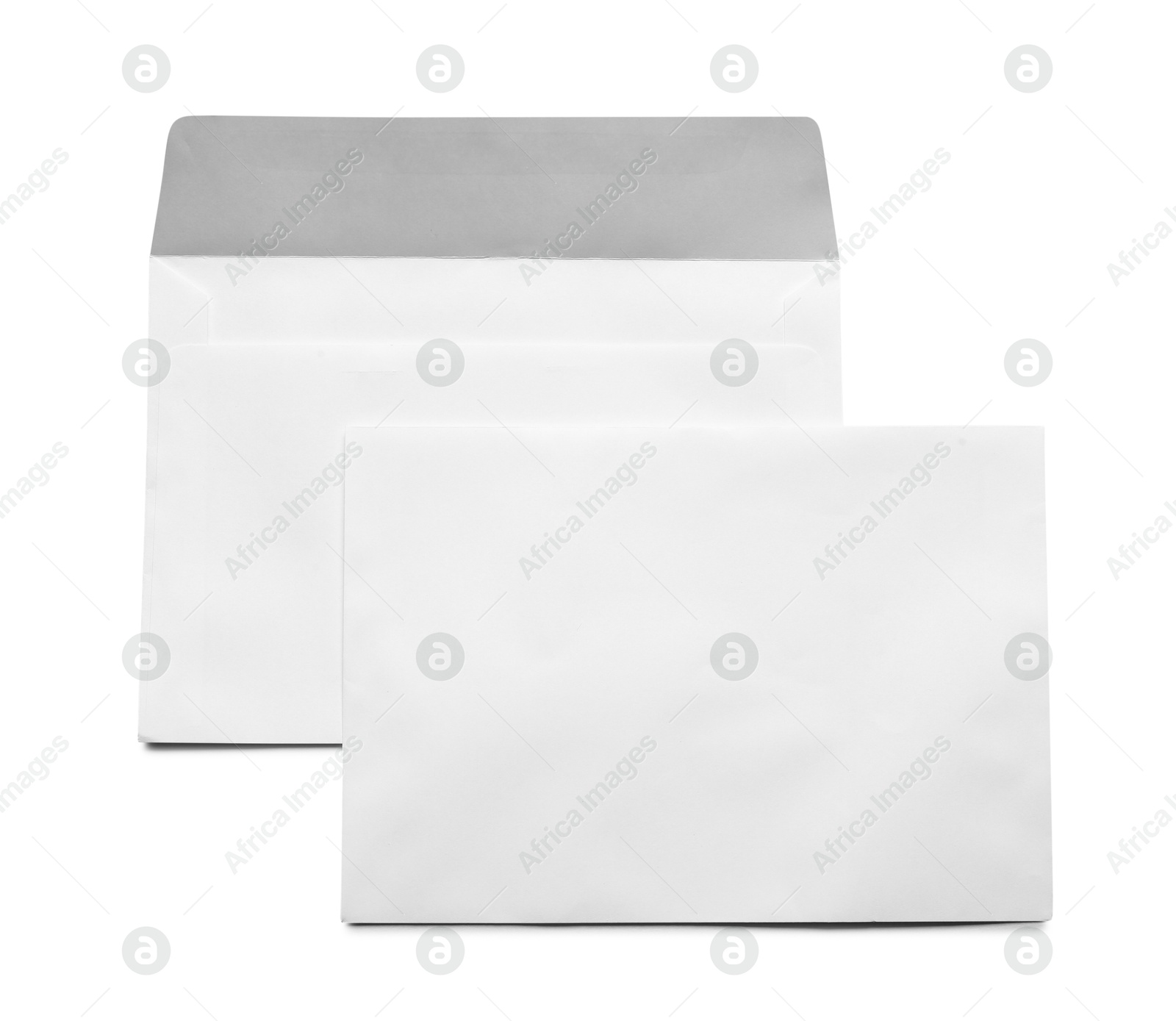 Photo of Envelopes isolated on white, top view. Mockup for design