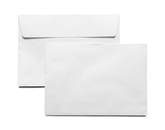 Photo of Envelopes isolated on white, top view. Mockup for design