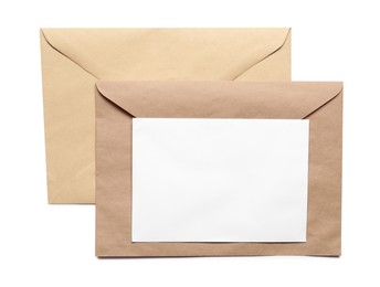 Photo of Envelopes isolated with card on white, top view. Mockup for design