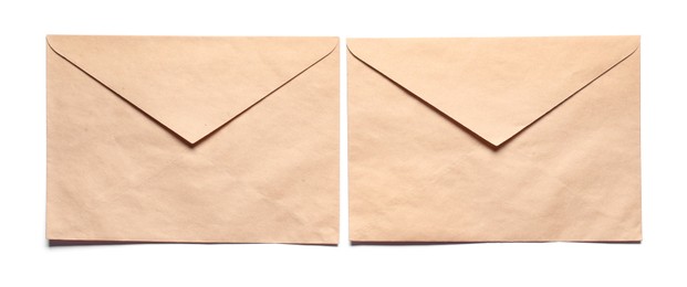 Photo of Envelopes isolated on white, top view. Mockup for design