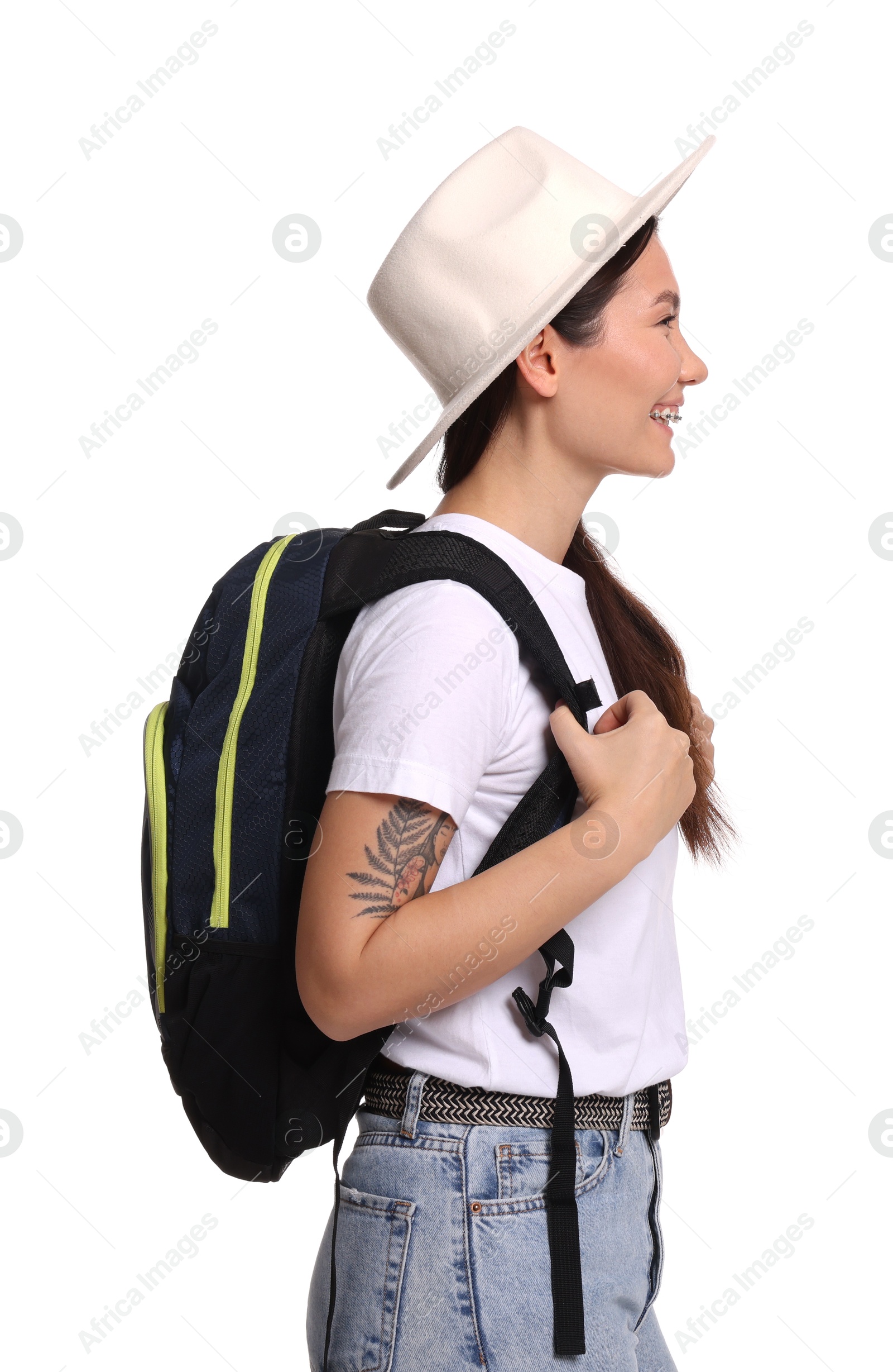 Photo of Traveller in hat with backpack on white background