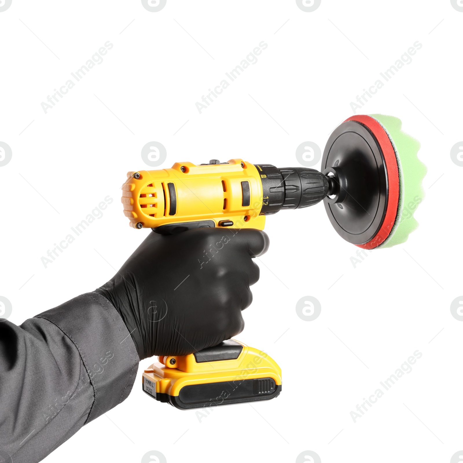 Photo of Man holding electric screwdriver with polish pad on white background, closeup