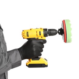 Photo of Man holding electric screwdriver with polish pad on white background, closeup