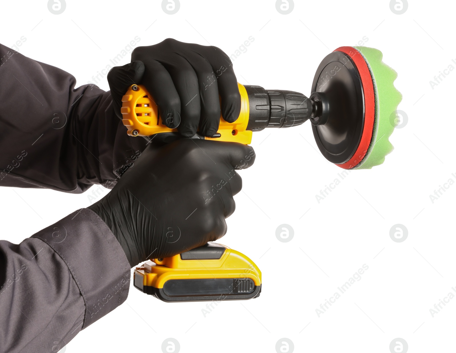 Photo of Man holding electric screwdriver with polish pad on white background, closeup