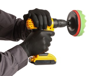 Photo of Man holding electric screwdriver with polish pad on white background, closeup