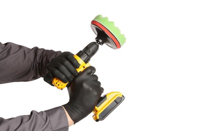 Photo of Man holding electric screwdriver with polish pad on white background, closeup