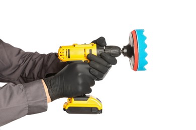 Photo of Man holding electric screwdriver with polish pad on white background, closeup