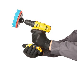 Photo of Man holding electric screwdriver with polish pad on white background, closeup