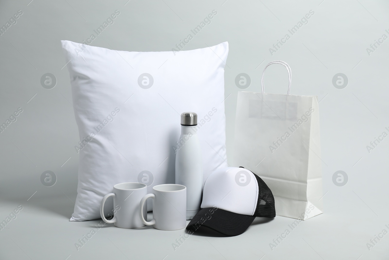 Photo of Different blank items for branding on light grey background. Mockup for design