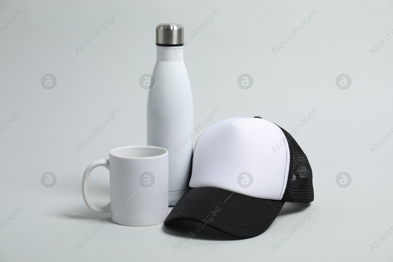 Photo of Different blank items for branding on light grey background. Mockup for design