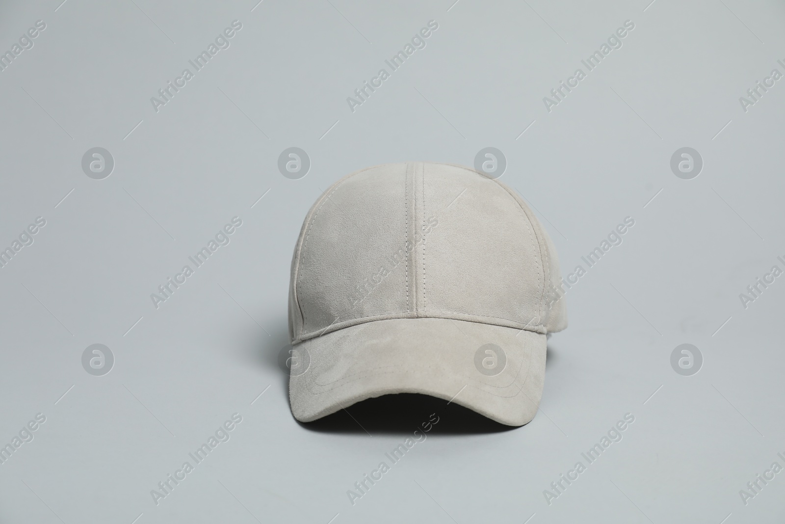 Photo of Blank baseball cap for branding on light grey background. Mockup for design