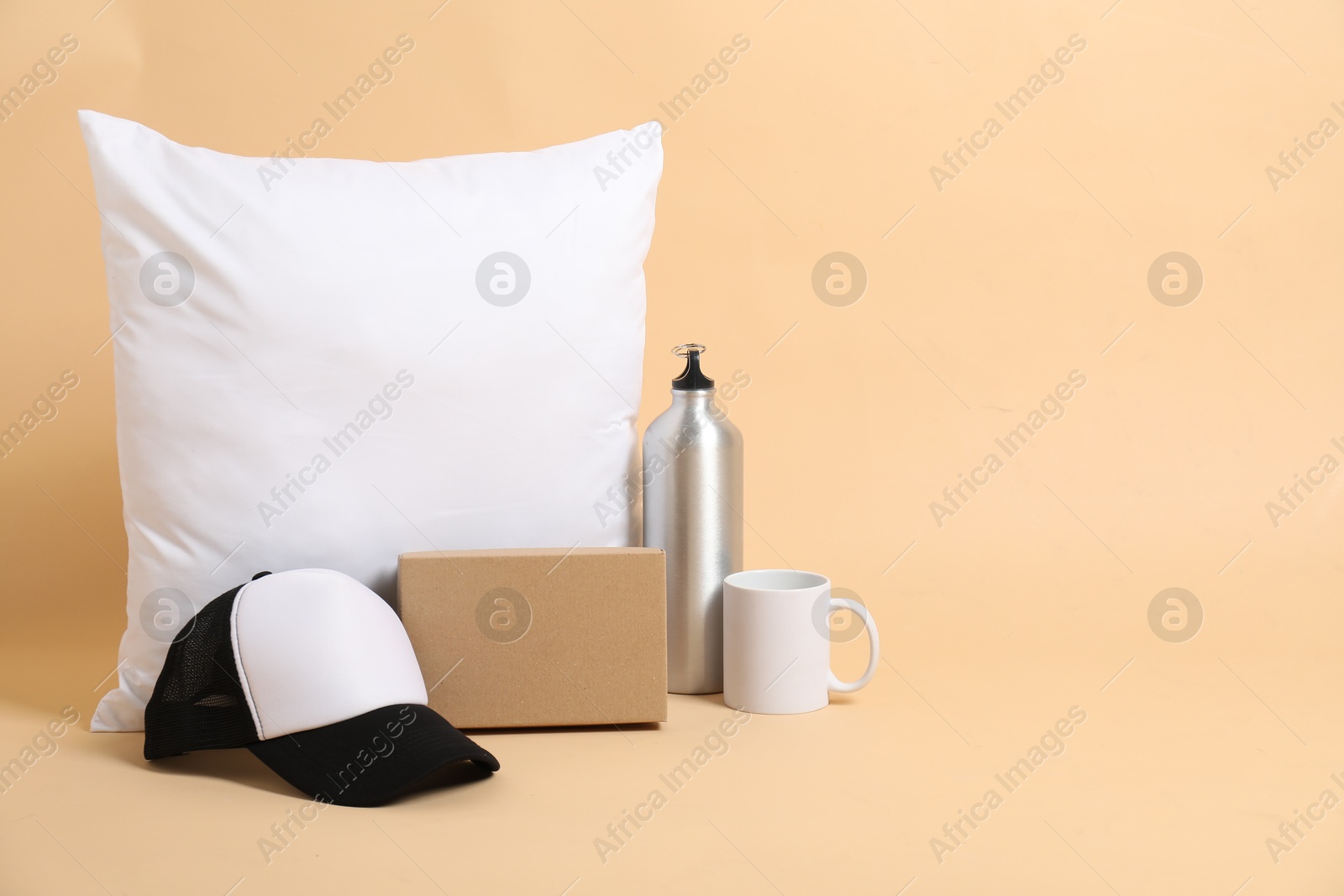 Photo of Different blank items for branding on beige background. Mockup for design