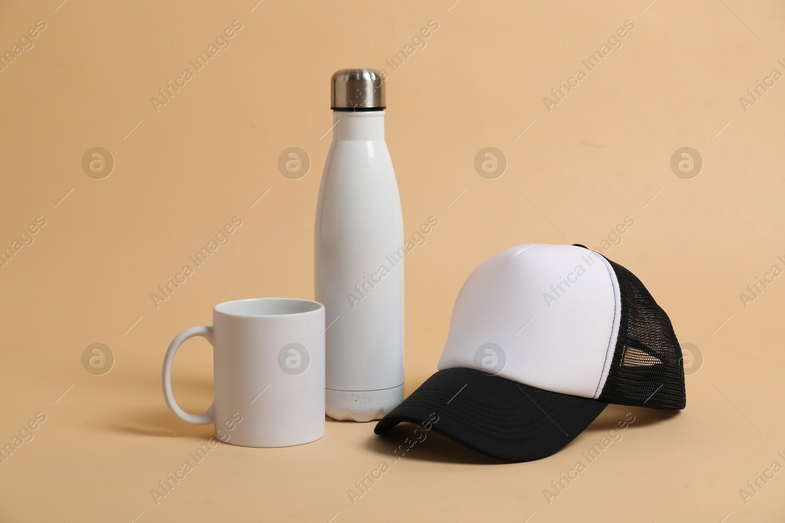 Photo of Different blank items for branding on beige background. Mockup for design