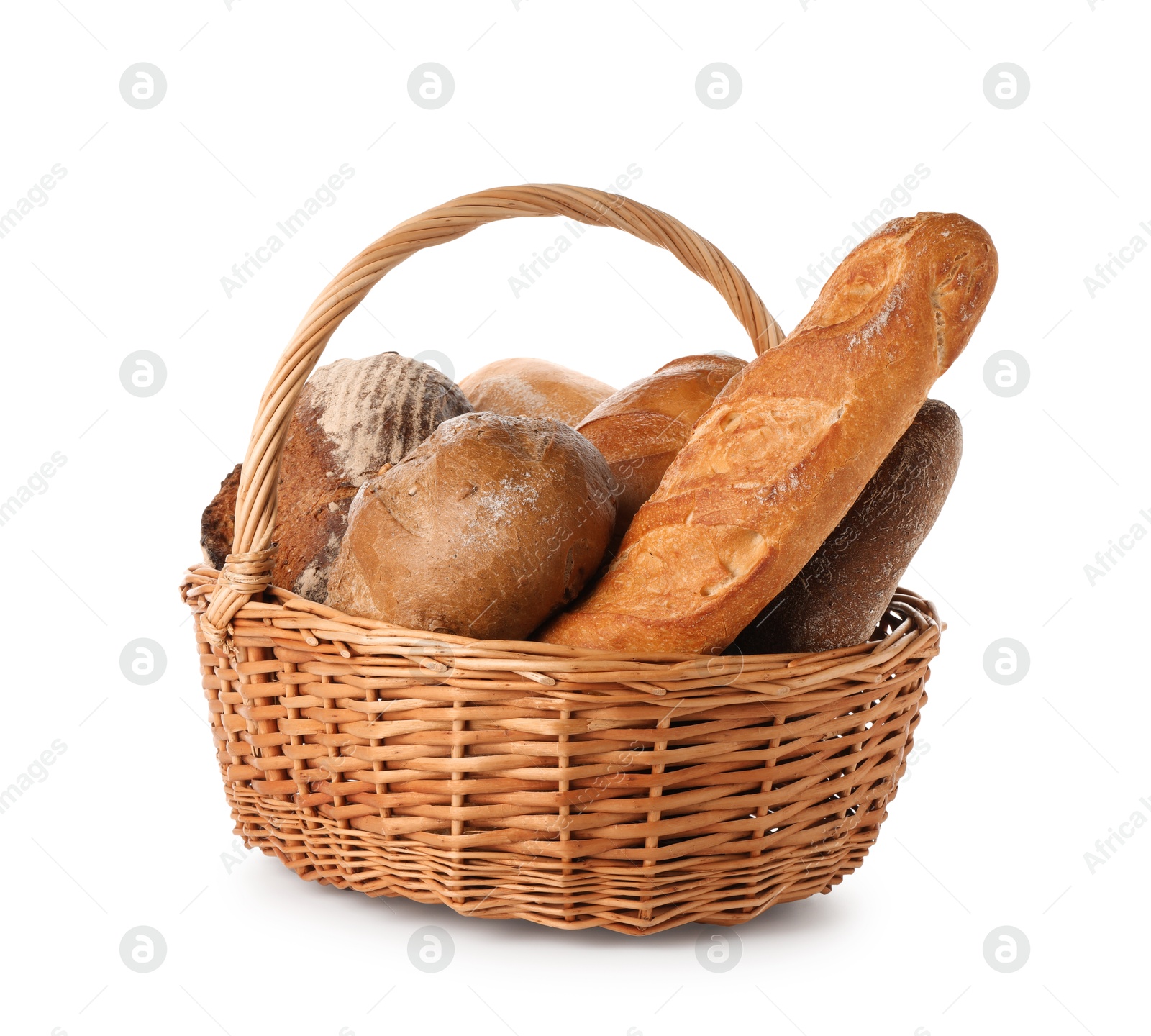 Photo of Different freshly baked bread loafs in wicker basket isolated on white