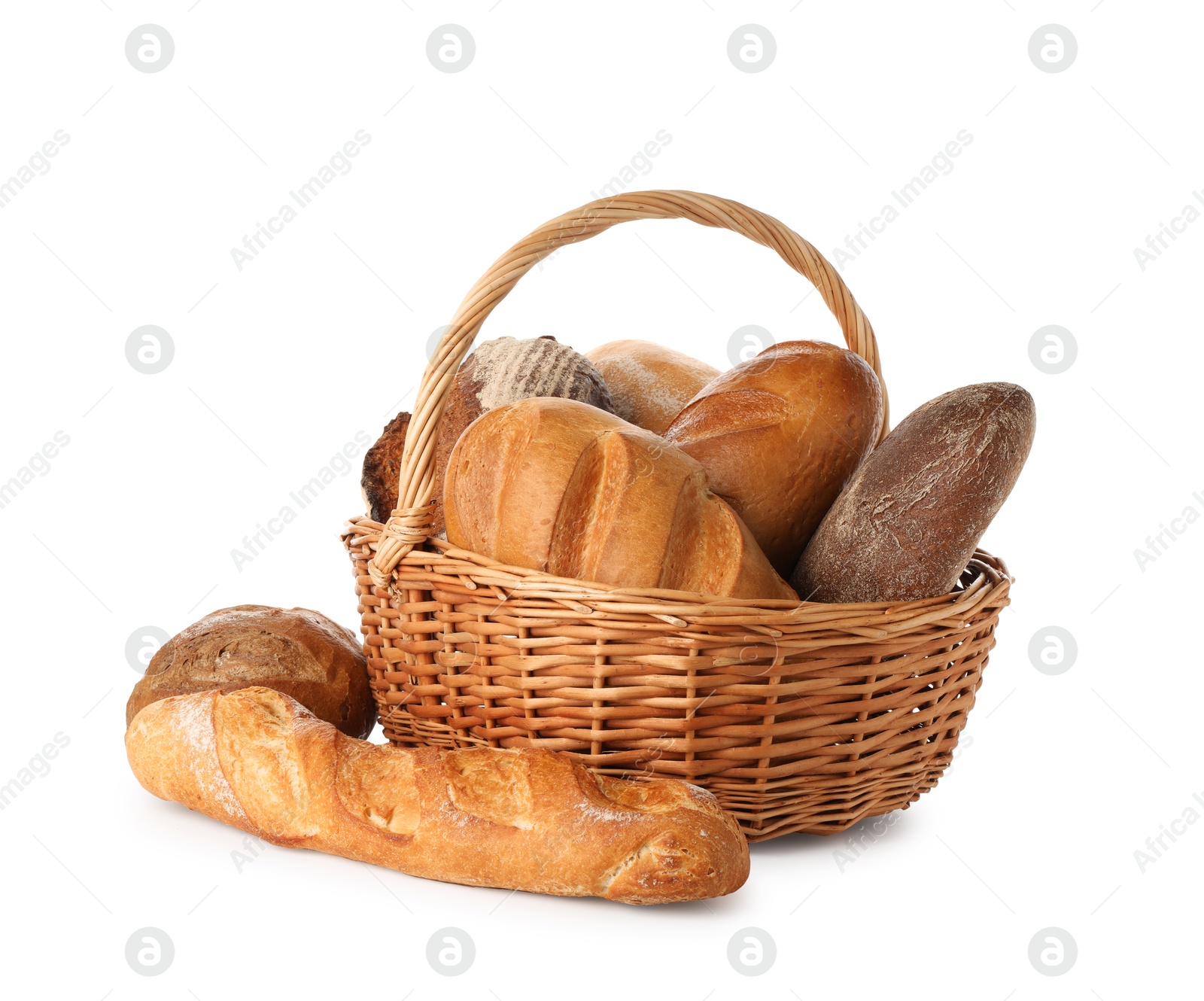 Photo of Different freshly baked bread loafs in wicker basket isolated on white