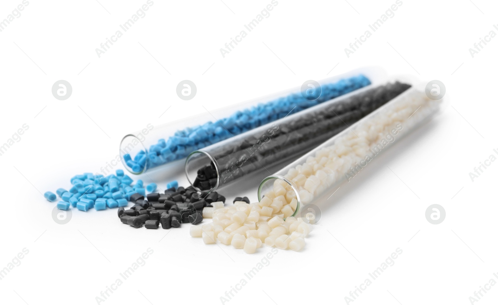 Photo of Colorful plastic granules in test tubes isolated on white