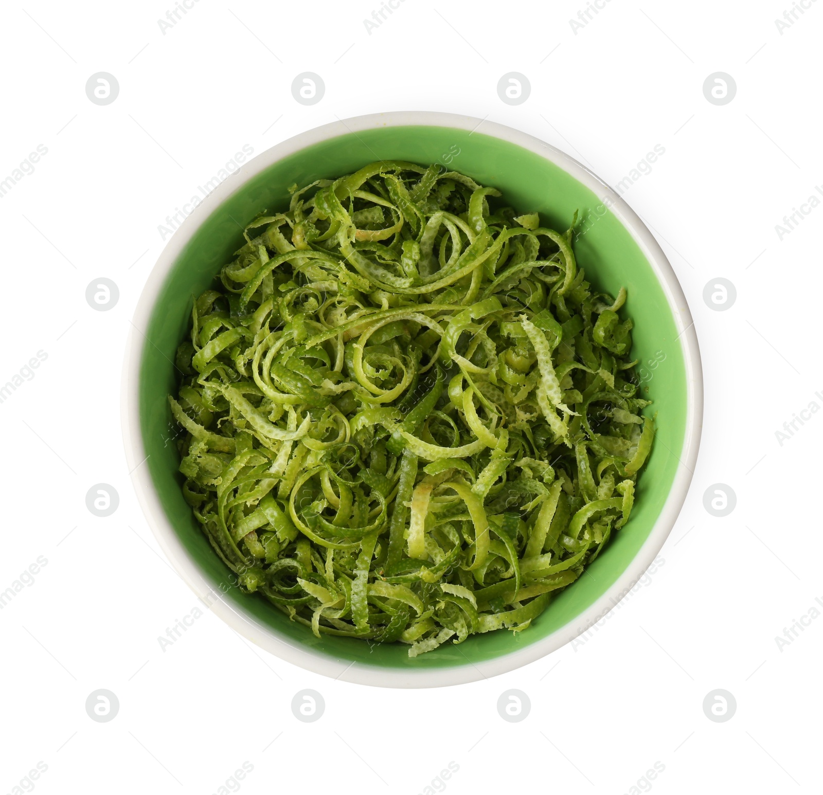 Photo of Fresh lime zest in bowl isolated on white, top view