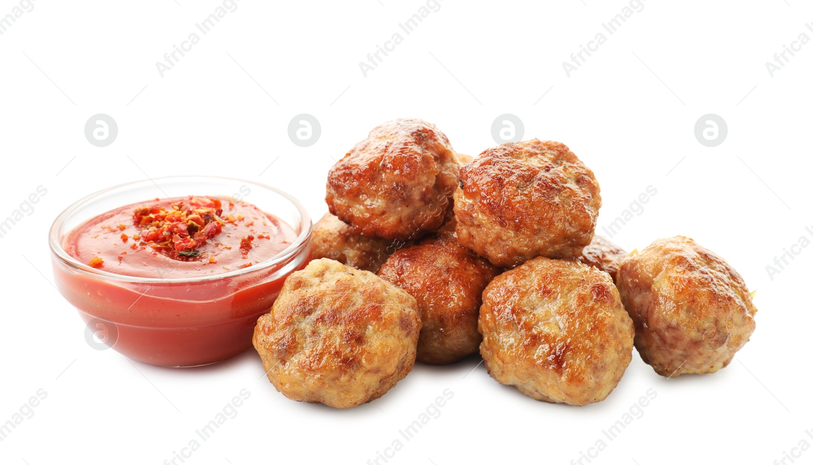 Photo of Pile of delicious meatballs and bowl with ketchup isolated on white