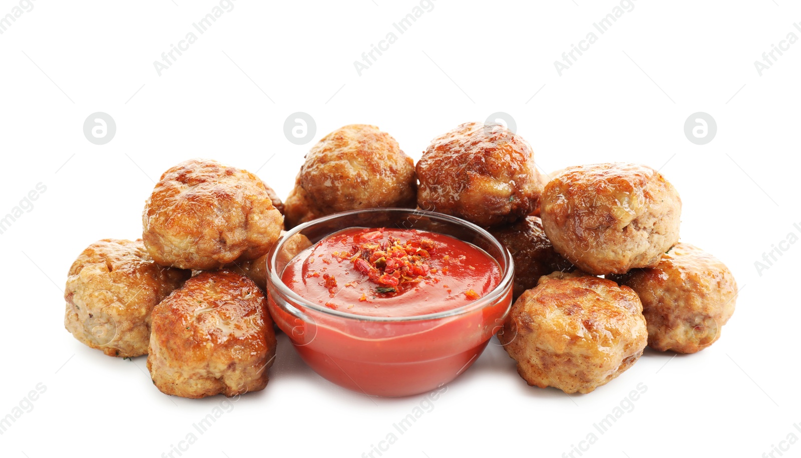 Photo of Pile of delicious meatballs and bowl with ketchup isolated on white