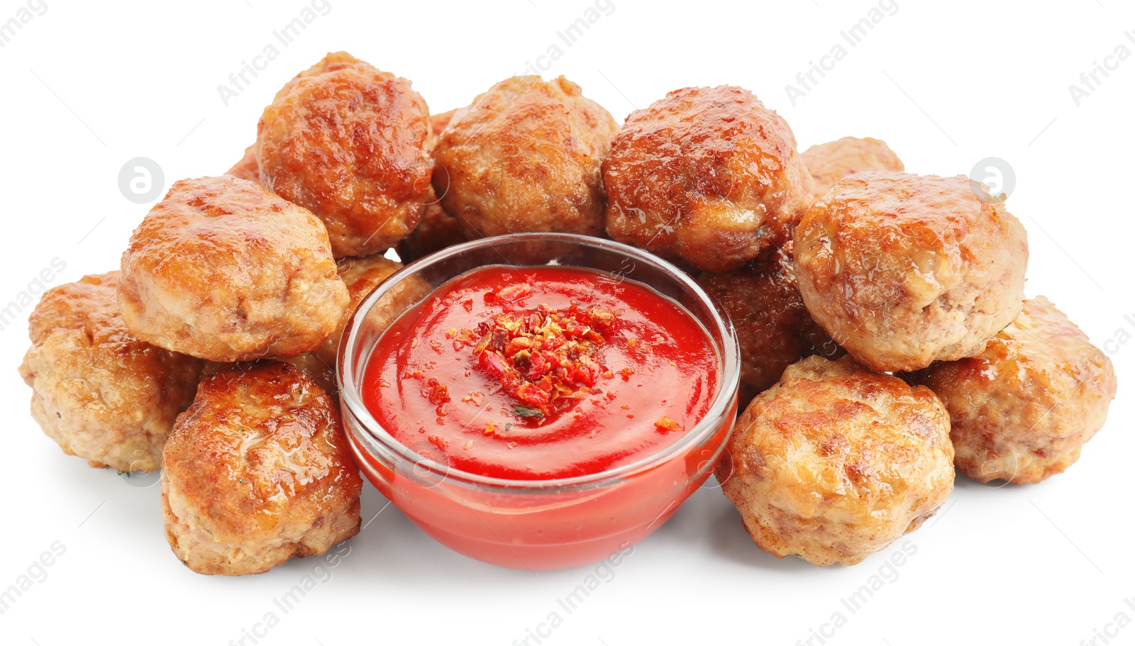 Photo of Pile of delicious meatballs and bowl with ketchup isolated on white