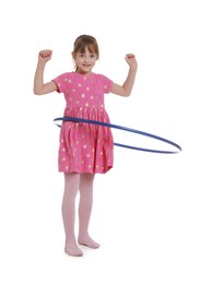 Photo of Cute little girl exercising with hula hoop on white background