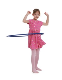 Photo of Cute little girl exercising with hula hoop on white background