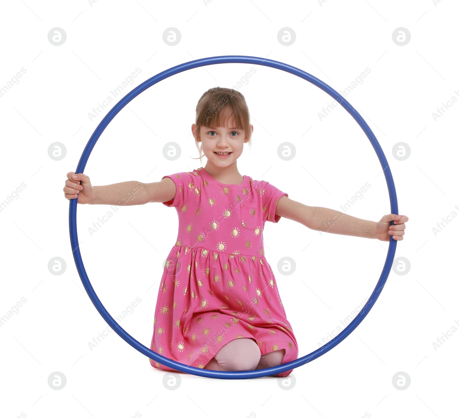 Photo of Cute little girl with hula hoop on white background