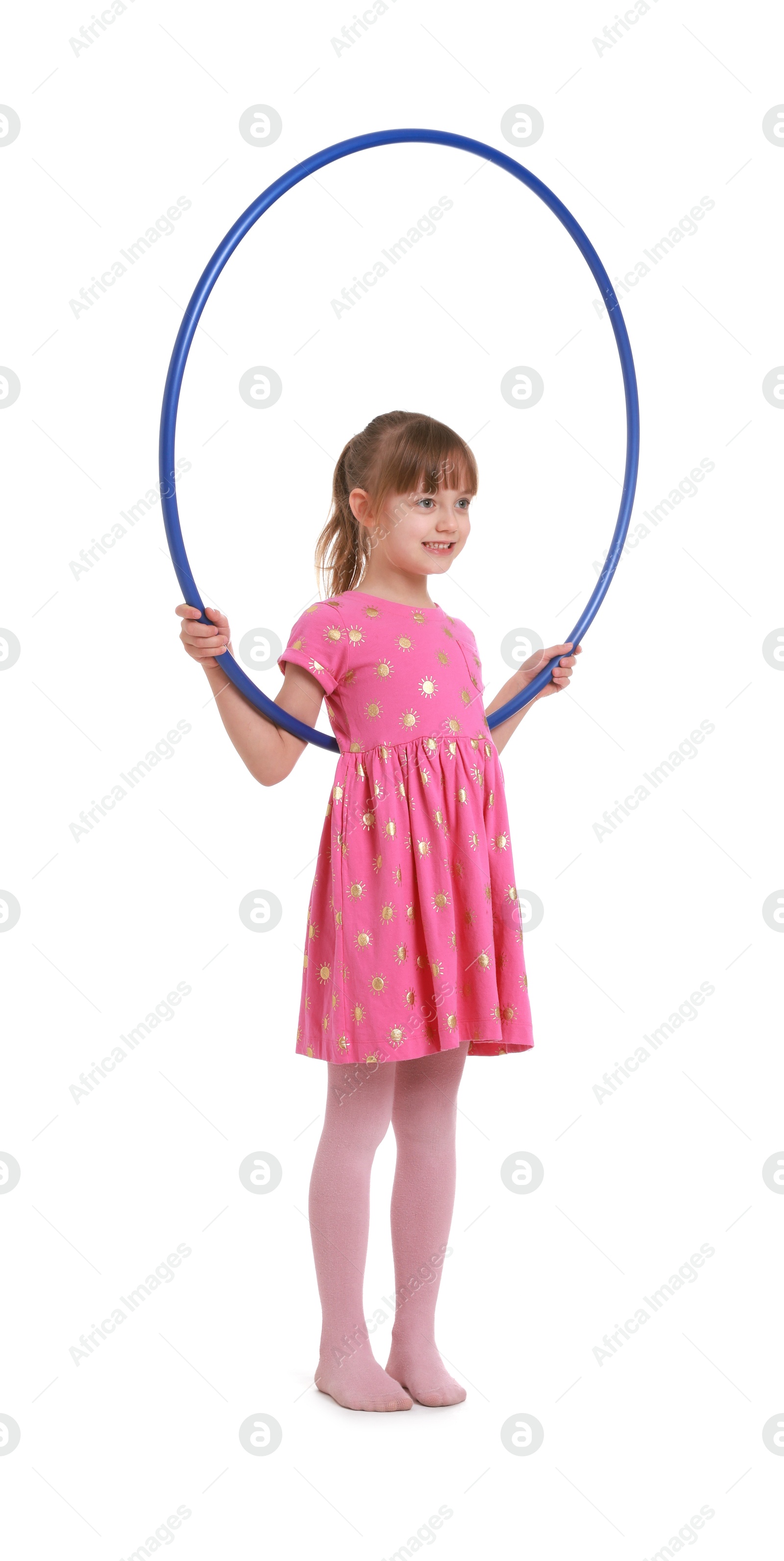 Photo of Cute little girl with hula hoop on white background