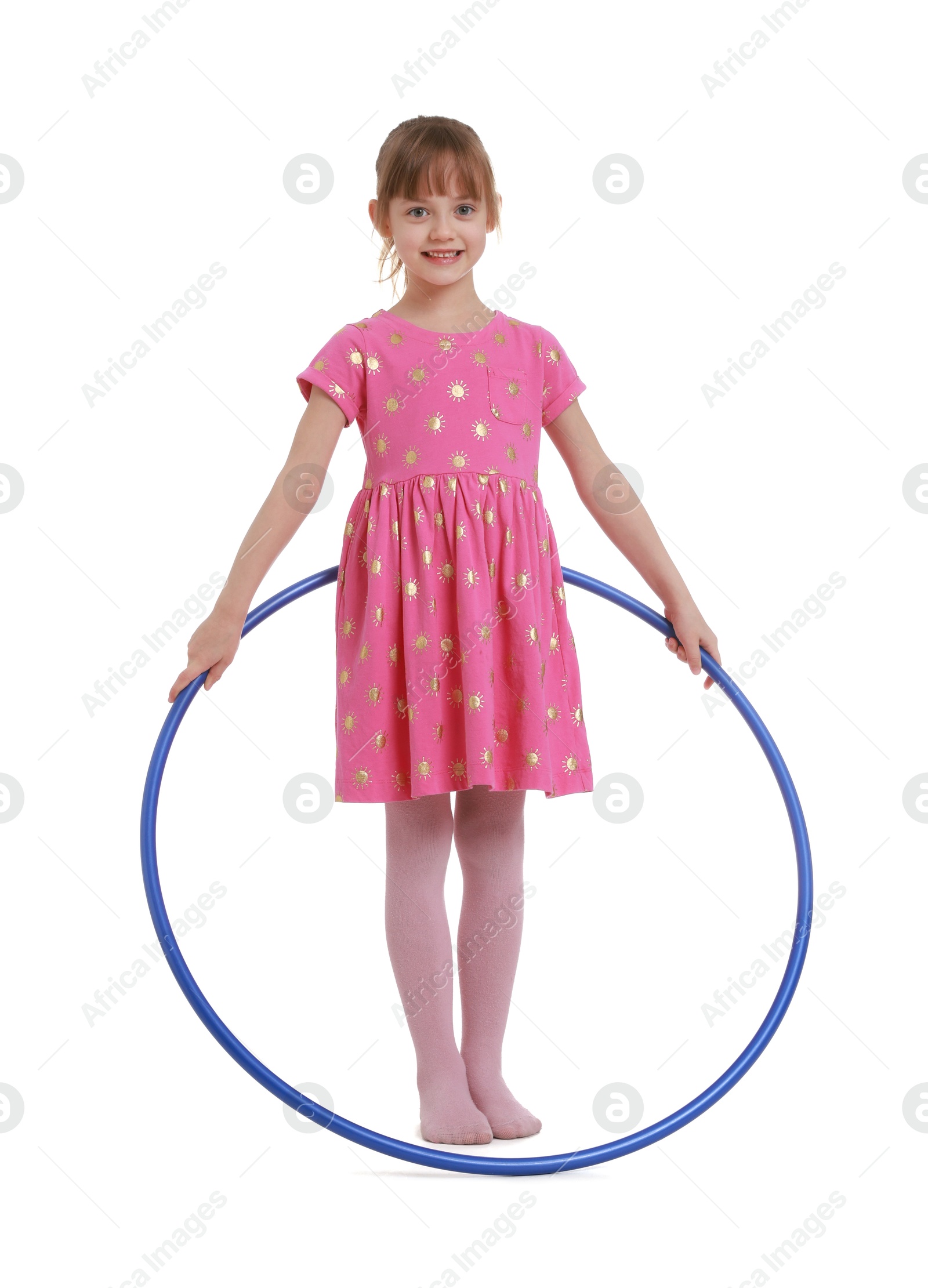 Photo of Cute little girl with hula hoop on white background