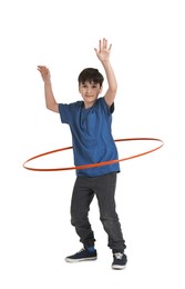 Boy exercising with hula hoop on white background