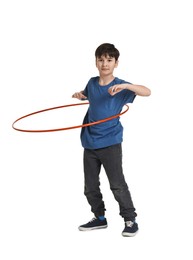 Photo of Boy exercising with hula hoop on white background