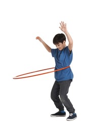 Photo of Boy exercising with hula hoop on white background