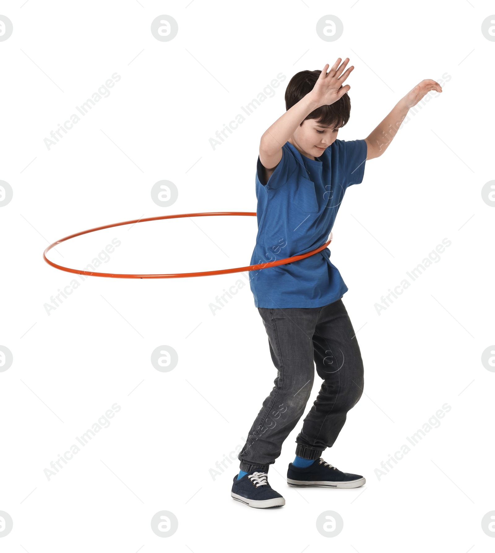 Photo of Boy exercising with hula hoop on white background