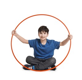 Photo of Smiling boy with hula hoop on white background