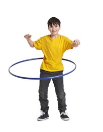 Photo of Boy exercising with hula hoop on white background