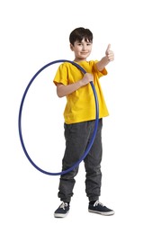 Photo of Boy with hula hoop showing thumbs up on white background