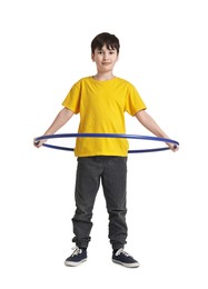 Photo of Boy exercising with hula hoop on white background