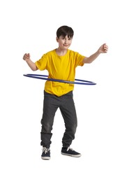 Photo of Boy exercising with hula hoop on white background