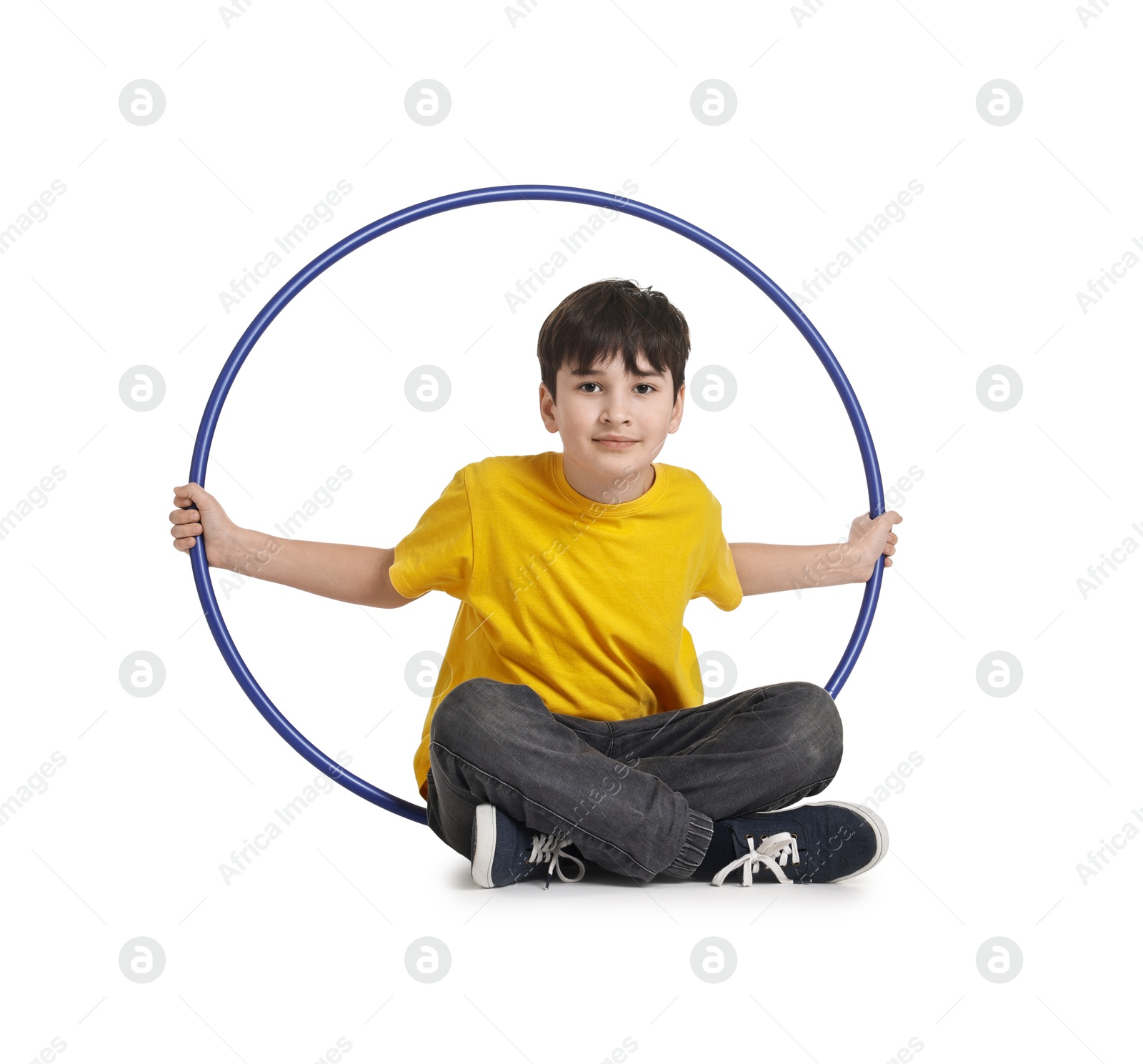 Photo of Boy with hula hoop on white background