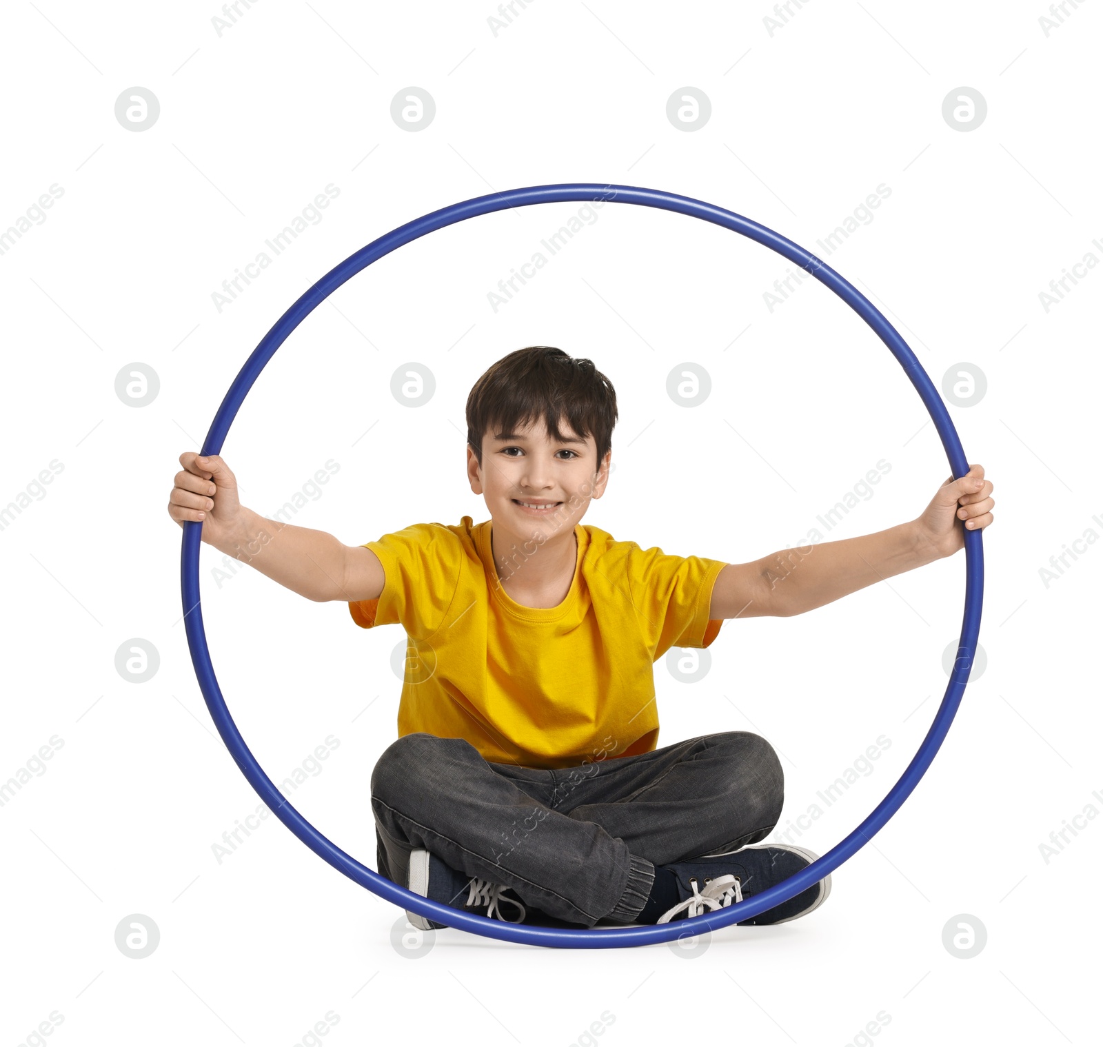 Photo of Smiling boy with hula hoop on white background