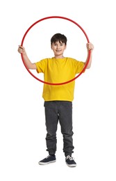 Photo of Smiling boy with hula hoop on white background