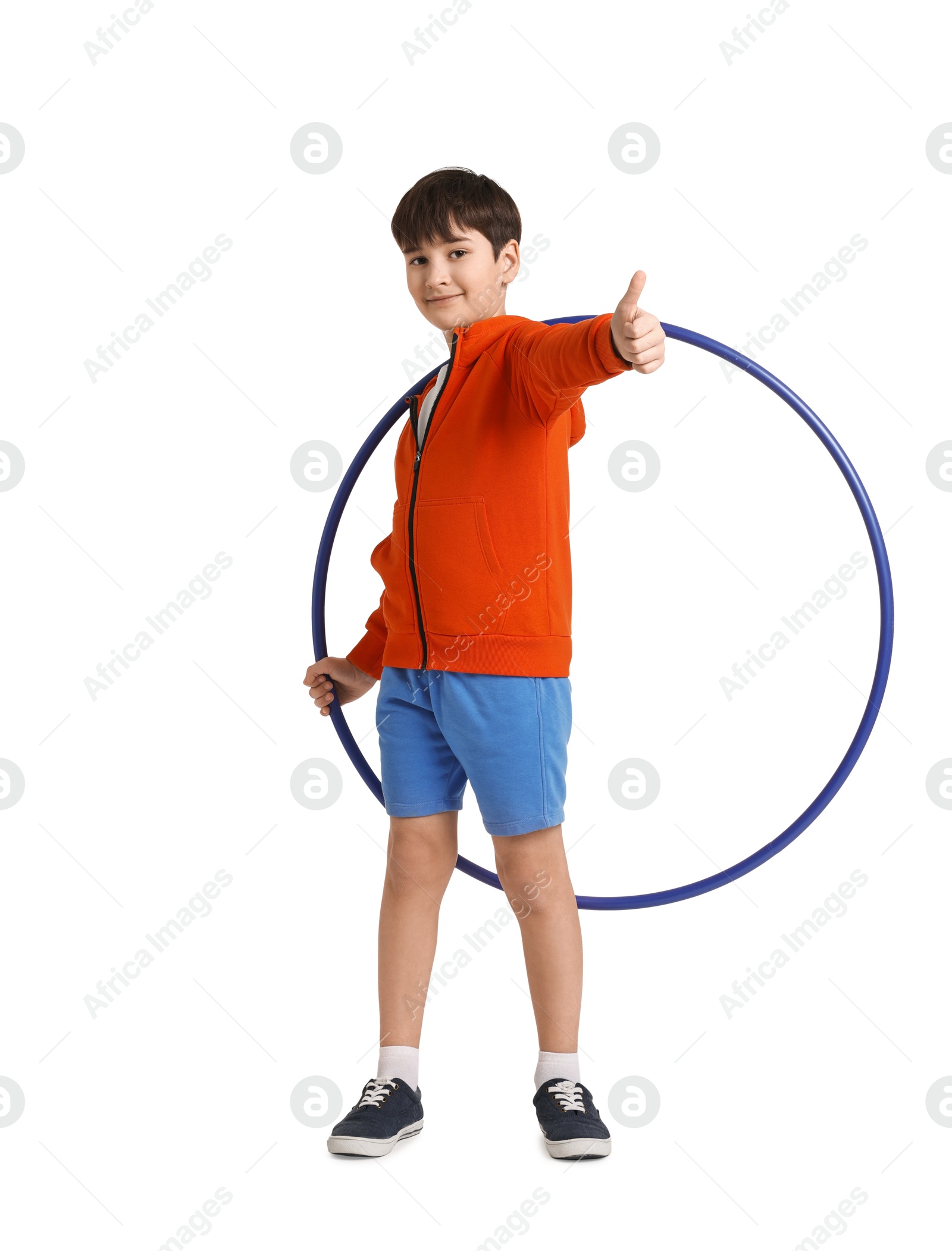 Photo of Boy with hula hoop showing thumbs up on white background