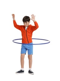 Photo of Boy exercising with hula hoop on white background