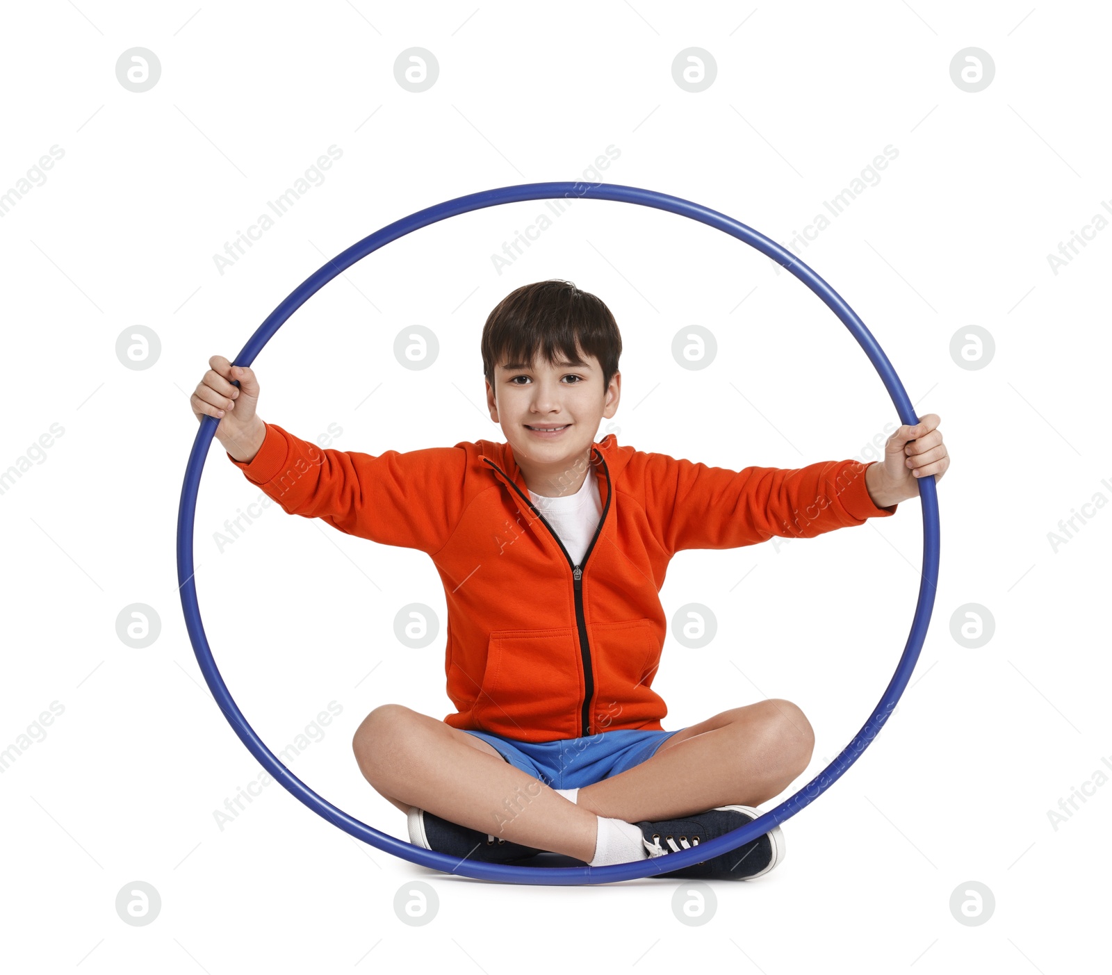 Photo of Smiling boy with hula hoop on white background